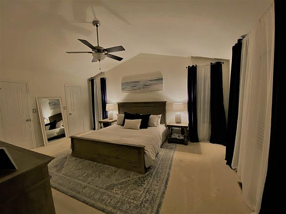 Master Bedroom with 2 walk in closets. (King size bed pictured)