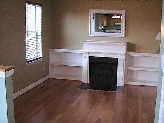 Family room with bamboo flooring and gas fireplace