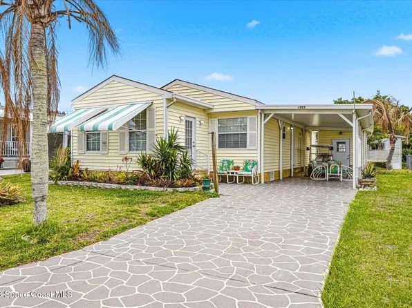 1027 Oriole Cir, Barefoot Bay, FL 32976