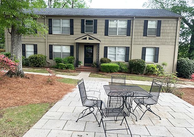 Ground floor unit with shared front patio.