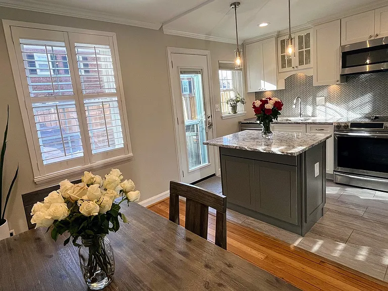 Plantation shutters throughout main floor allow for maximum sun and privacy.