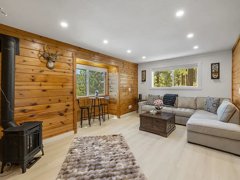 One of two living areas with gas fireplace.