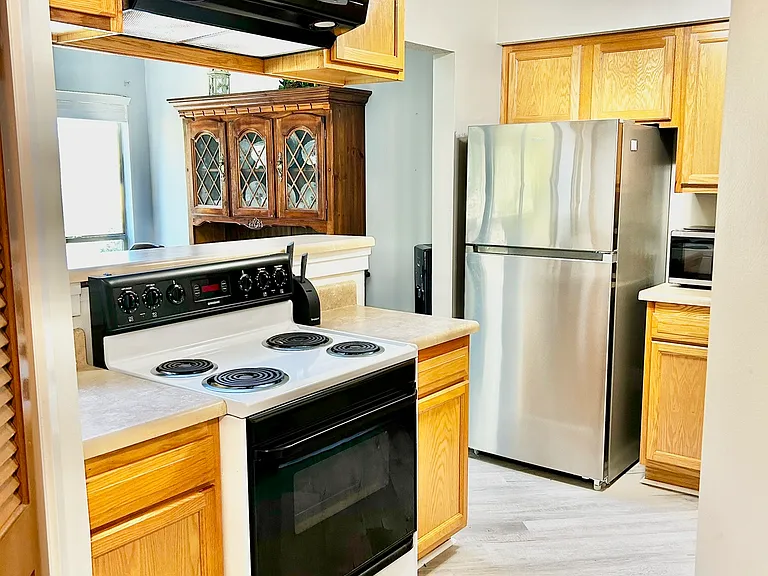 Kitchen with New Refrigerator and New Dish Washer