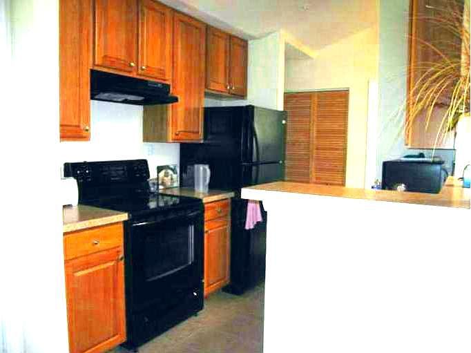 Kitchen has lots of cabinets & counter space!