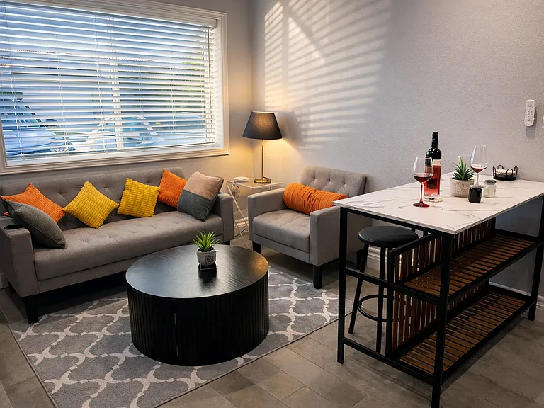 Bright furnished studio with queen bed and private entrance