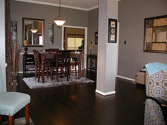 Sit down, read a paper and relax in this dining room.