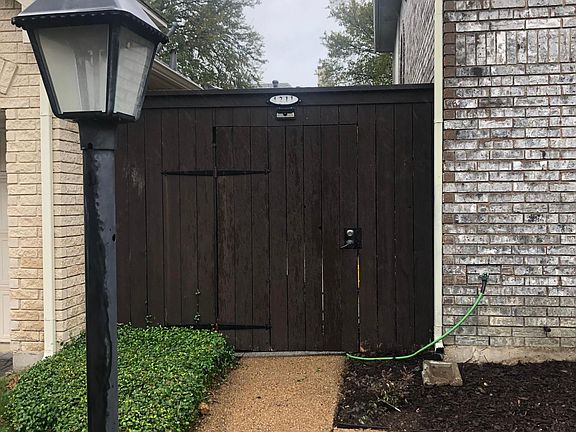 SIDE ENTRANCE TO PRIVATE COURT YARD