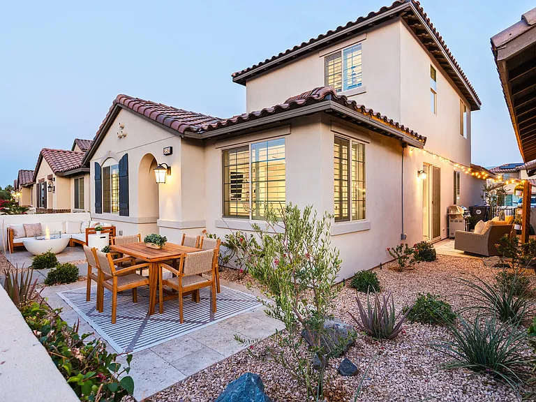 Step to the side patio where you will find more comfy seating.
