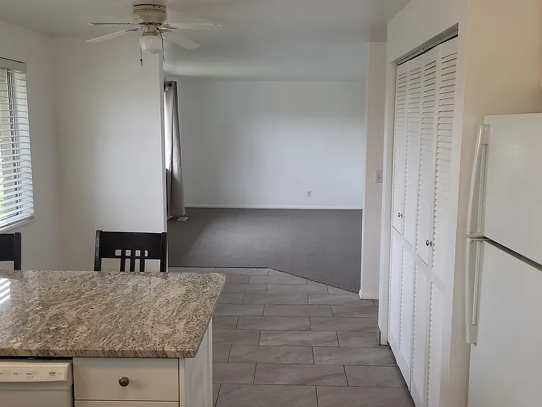 Kitchen looking to living room