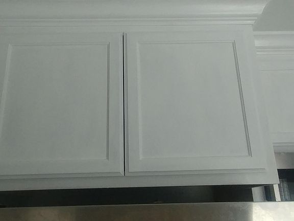 Upper Cabinets above Refrigerator in Kitchen