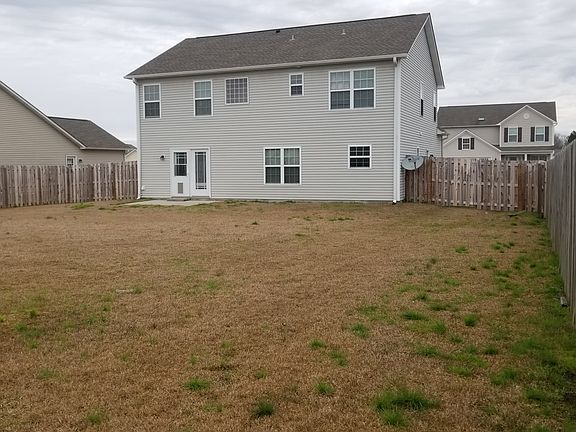 Fully fenced backyard.