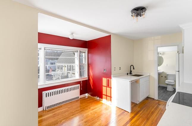 floating shelves to be installed above kitchen sink + dishwasher to be installed.