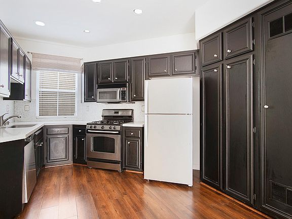 Kitchen has stainless steel appliances