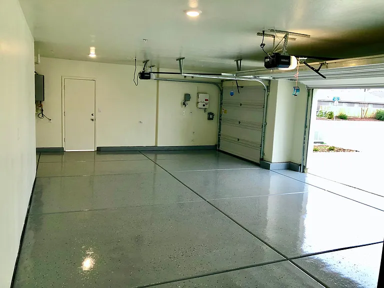 3 car finished garage with sealed floors.