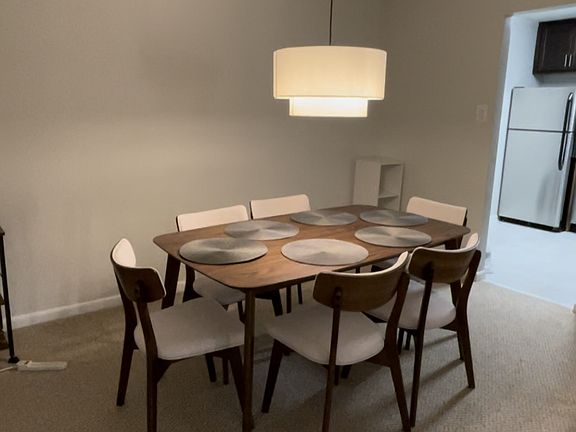 Spacious Dining room with plenty of space for sideboards or carts.