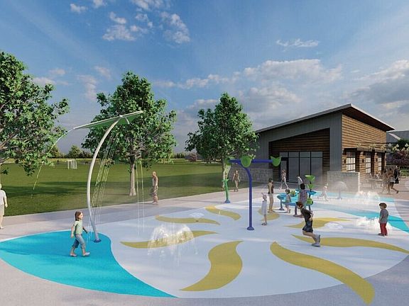 Relax as your kids enjoy a warm afternoon at the splash pad.