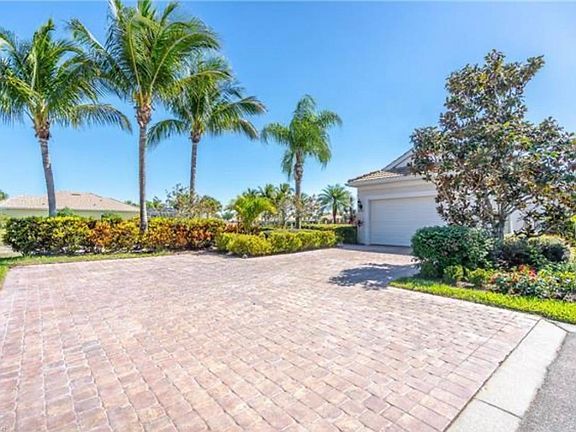 Extended paver brick driveway.