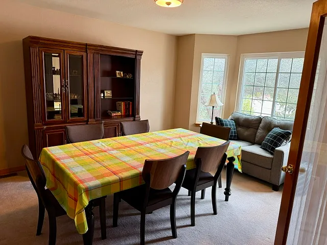Shared formal dining and sitting area. This is the "quiet" room which allows you to close the French doors for more privacy.