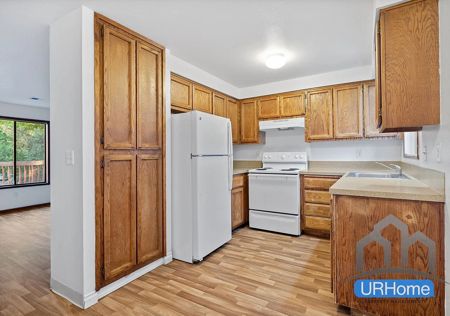 Inviting 2-Bed Retreat | Fireplace, Garage & In-Unit Laundry — Photo 4