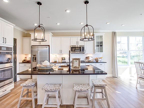 Kitchen with island and pendant lighting