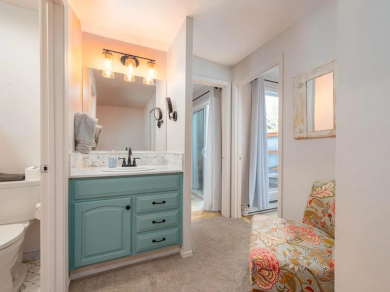 Full bathroom upstairs has shower/toilet and then separate vanity area to maximize usage.