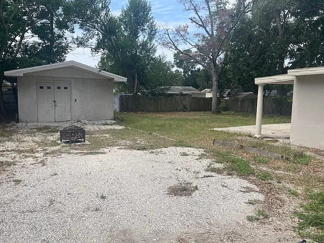 Concrete storage room with electric in back yard