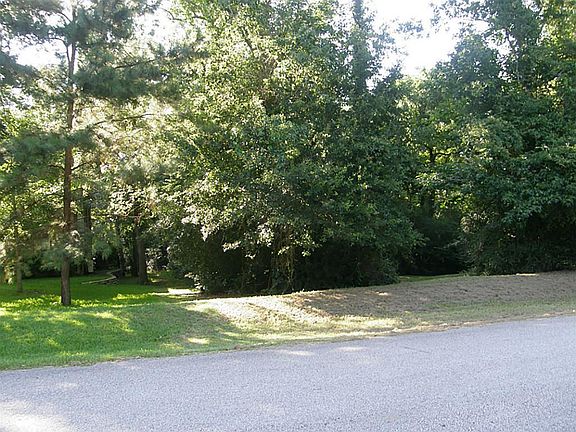 Unimproved lot waiting for your custom built home.