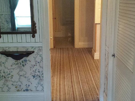 Large bedroom looking toward the bathroom.
