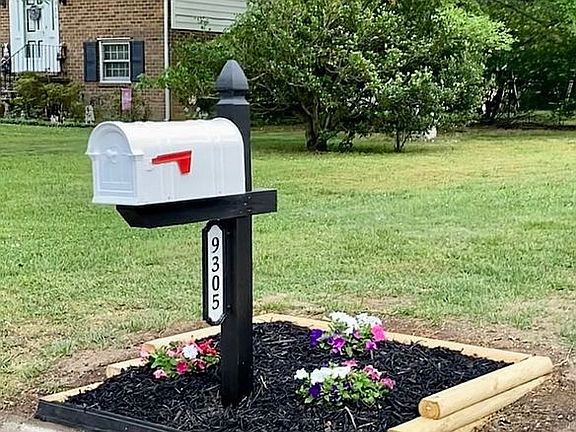 New mailbox and flower beds