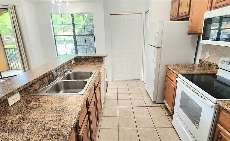 6171 Metrowest Blvd #107 — Photo 3