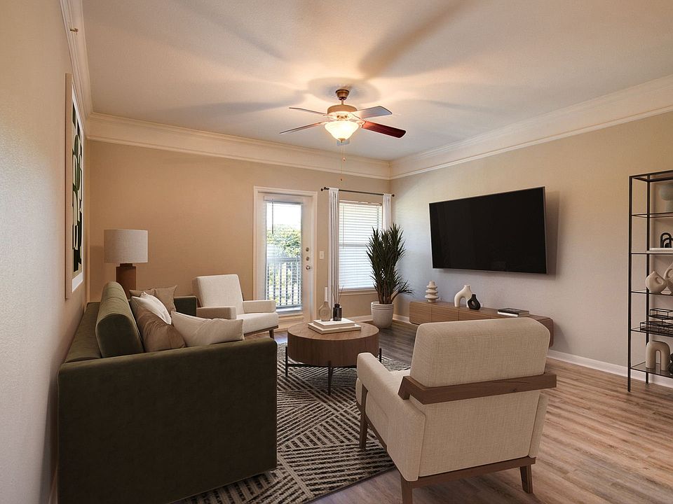 Spacious Living Room with Hardwood-Style Flooring