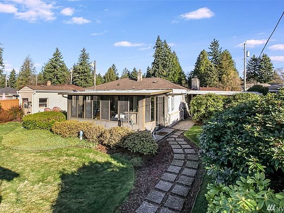 The addition of an enclosed sunroom at the back of the house allows natural light to flow throughout. Eat-in kitchen features a newer stainless steel refrigerator and granite counters. The guest bathroom  features newer tile and vanity. Enjoy the fully fenced, well-manicured backyard. This home is ideally located for the commuter with easy access to freeways, rapid transit, major retail, dining and business hubs. 