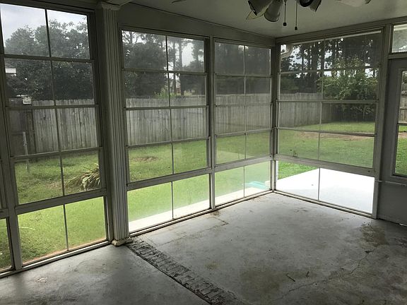 Sunroom side yard view Rear yard from Sunroom