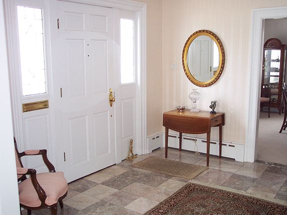 Foyer w/ marble flooring