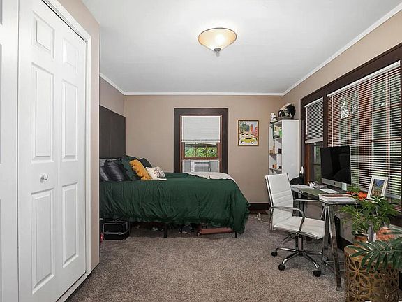 Bedroom large enough for home office, natural light