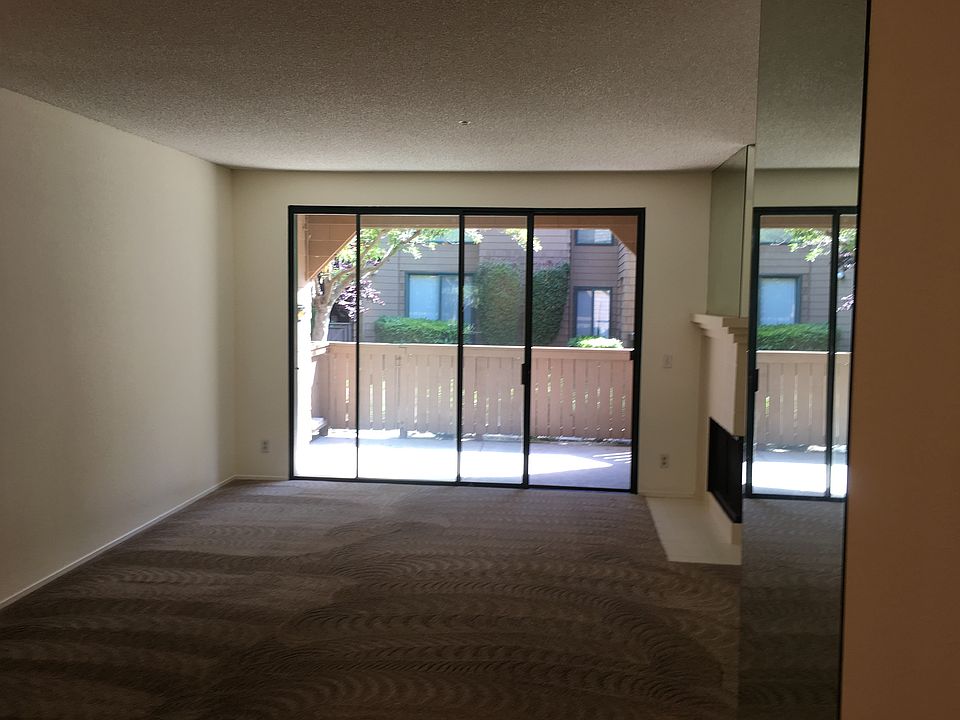 Living room overlooking covered patio