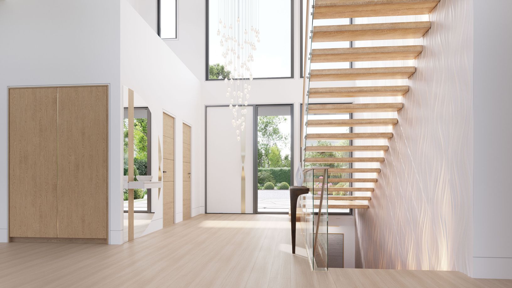 A striking custom pivot door opens to a light-filled foyer defined by floating stairs .