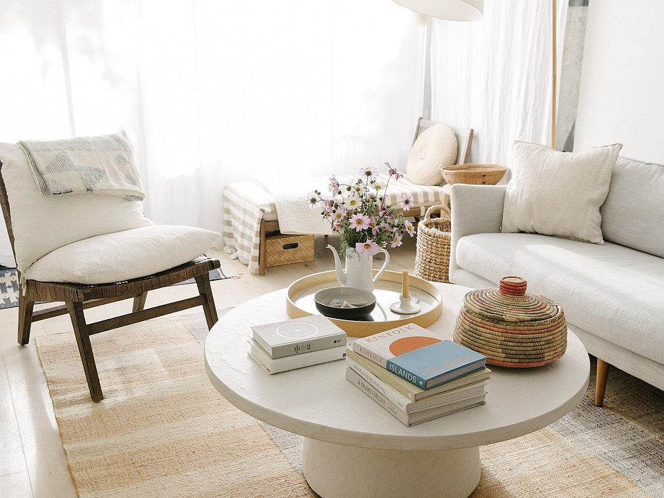Light, airy living space with big windows and access to private outdoor patio.
