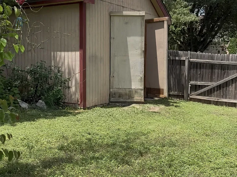 Large storage shed in the backyard.