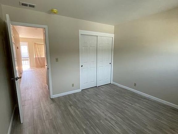 Bedroom 1 with closet on right