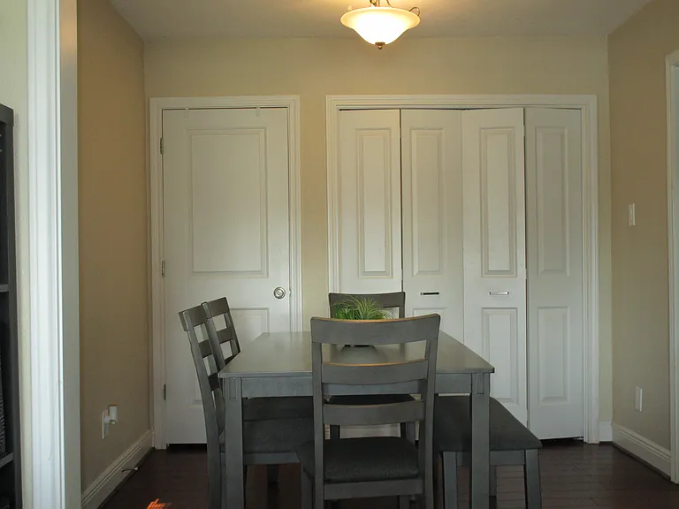 dining room. W/D behind bi-fold door on right and closet pantry on left side.