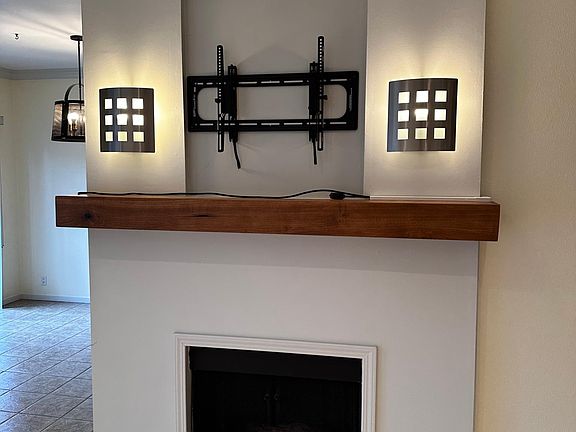 TV mount already installed above the fireplace