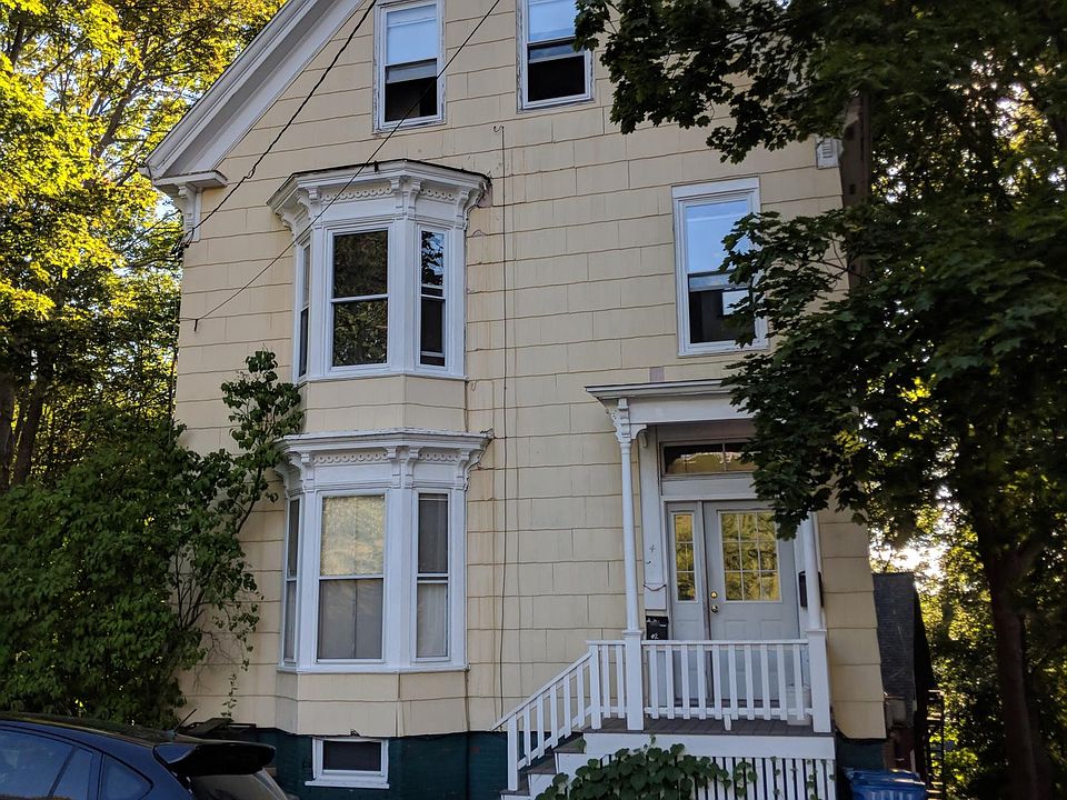 View of house from street; main entrance.