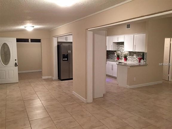 View to Kitchen and Front Door