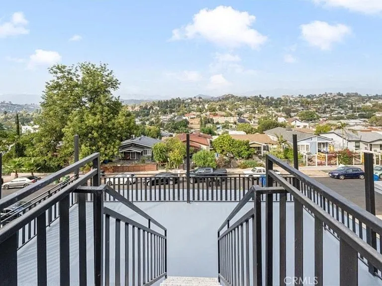 Rooftop deck view looking towards front of house/street