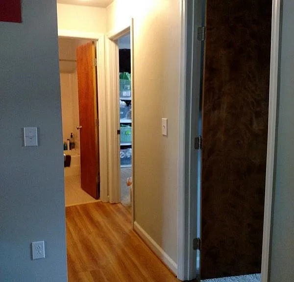 Hall to both bedrooms and shared bath
