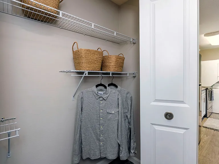 Step into a world of organized bliss with our roomy closets featuring built-in wire organizers. Discover stress-free apartment living.