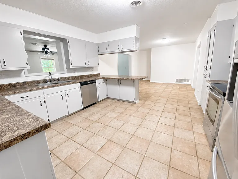Large Kitchen with Stainless Steal Applicances