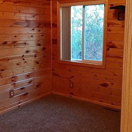 Knotty pine bedroom