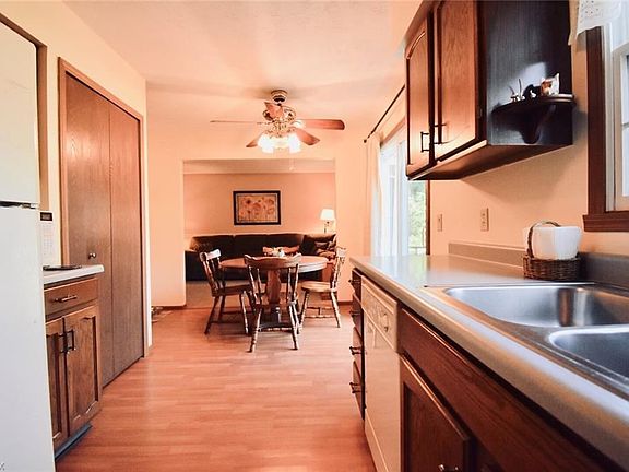 This view helps visualize the depth of the kitchen area. Note the large closet for storage. An additional pantry closet is not p